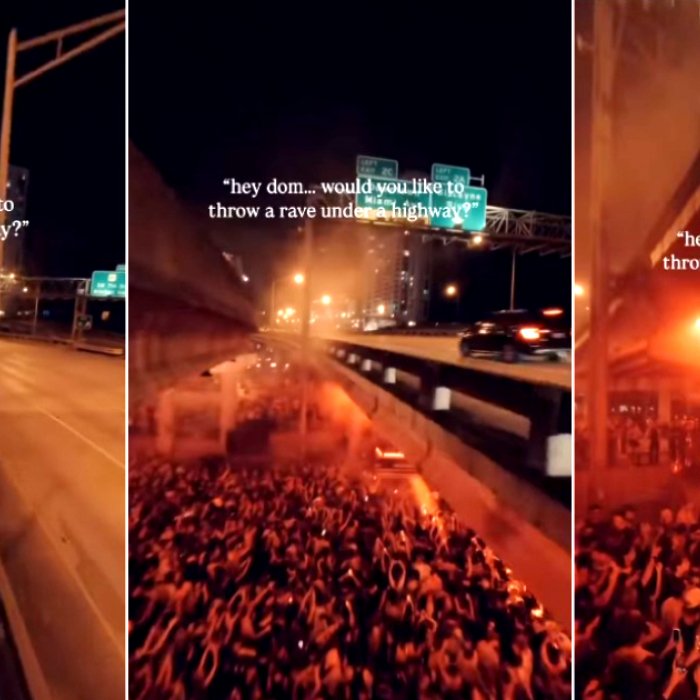 Impresionante vista aérea de la fiesta rave bajo una autopista en Miami, con luces y cientos de personas bailando.