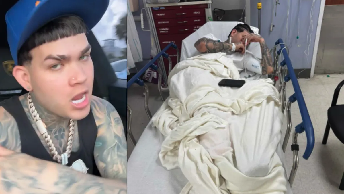 El reguetonero cubano El Carli en una camilla de hospital en Miami tras ser hospitalizado por una golpiza.