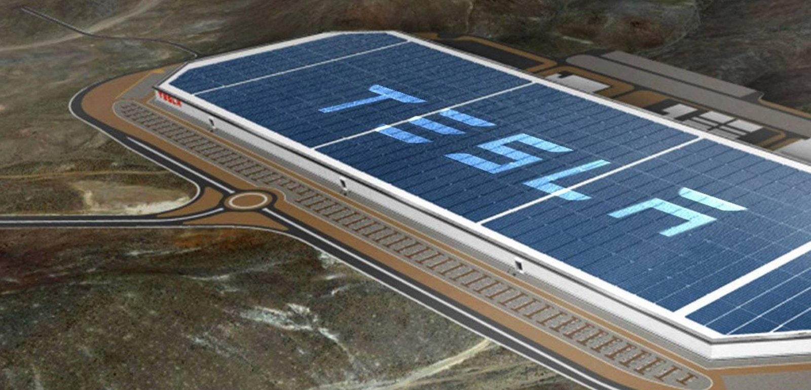 Vista aérea de una planta industrial de Tesla con el logo de la compañía, representando la nueva Tesla gigafactoría en China.